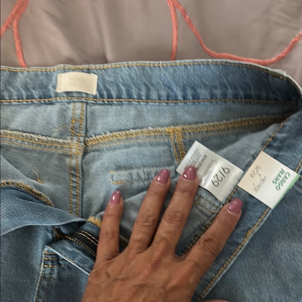 Jeans from Macy’s with tags. Wide leg loose fit, you can wear wide or tie bottom